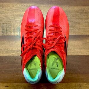Men’s size 9.5 red soccer cleats